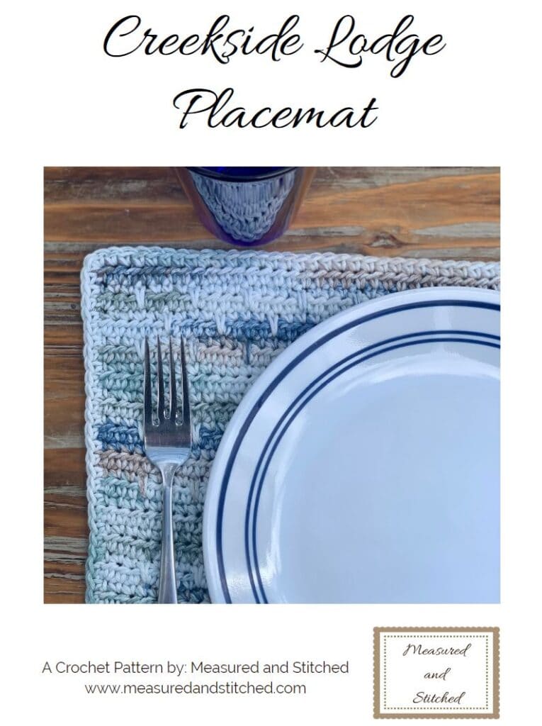 Creekside Lodge Placemat, dinner plate and fork on placemat, a crochet pattern by Measured and Stitched, www.measuredandstitched.com