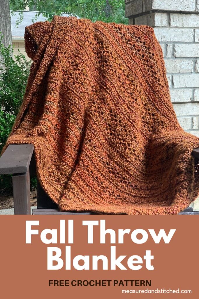 chunky fall throw blanket on outdoor chair, overlay text says "Fall Throw Blanket, Free Crochet Pattern, measuredandstitched.com"