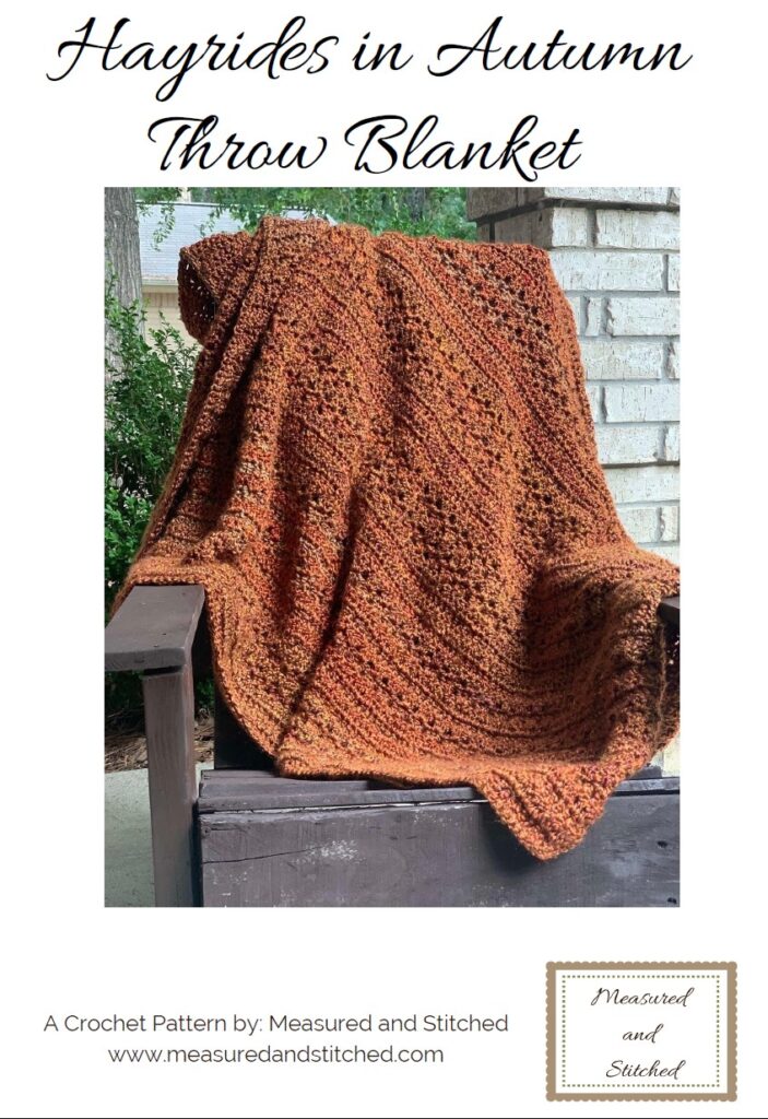 Cover of pattern with chunky throw blanket with overlay text "Hayrides in Autumn Throw Blanket, a crochet pattern by Measured and Stitched"