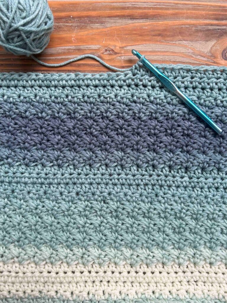 crochet project with ball of yarn and crochet hook