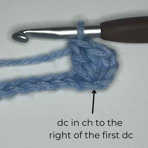 example of how to dc in ch to the right of the first dc, overlay text says "dc in ch to the right of the first dc"
