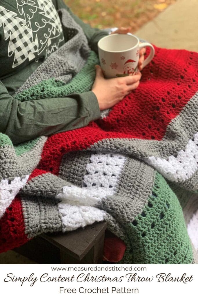 person drinking coffee with christmas throw blanket, overlay text says "www.measuredandstitched.com, Simply Content Christmas Throw Blanket, Free Crochet Pattern"