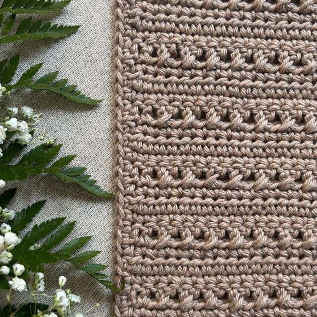 textured cotton dishcloth with greenery