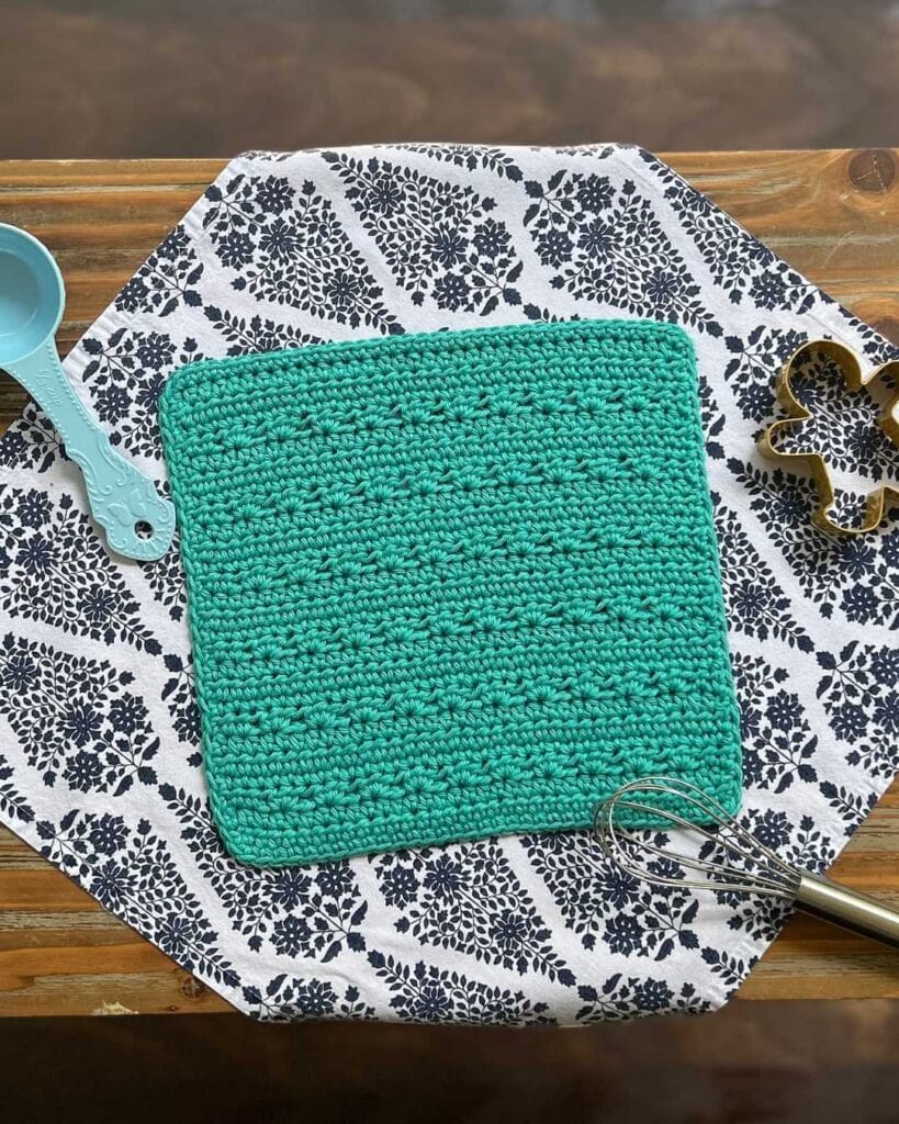 crochet dishcloth with kitchen items