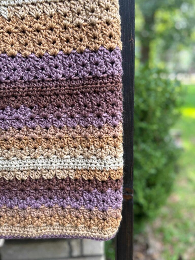 closeup of textured crochet throw blanket