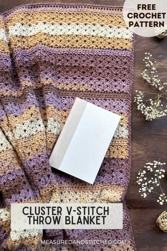 throw blanket with book, overlay text reads "cluster v-stitch throw blanket, measuredandstitched.com"