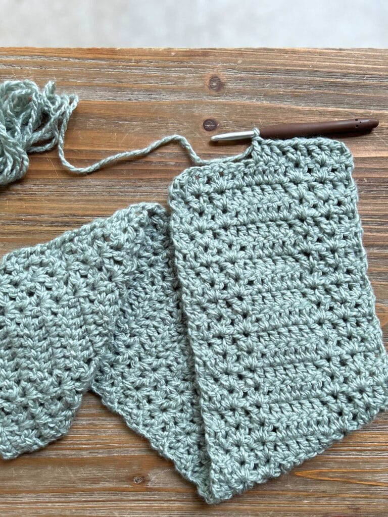 chunky crochet scarf project with yarn and hook