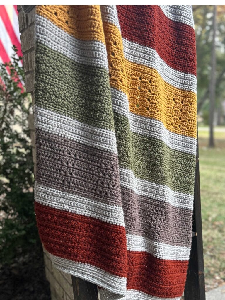 Stitch Samper Throw Blanket on outdoor blanket ladder