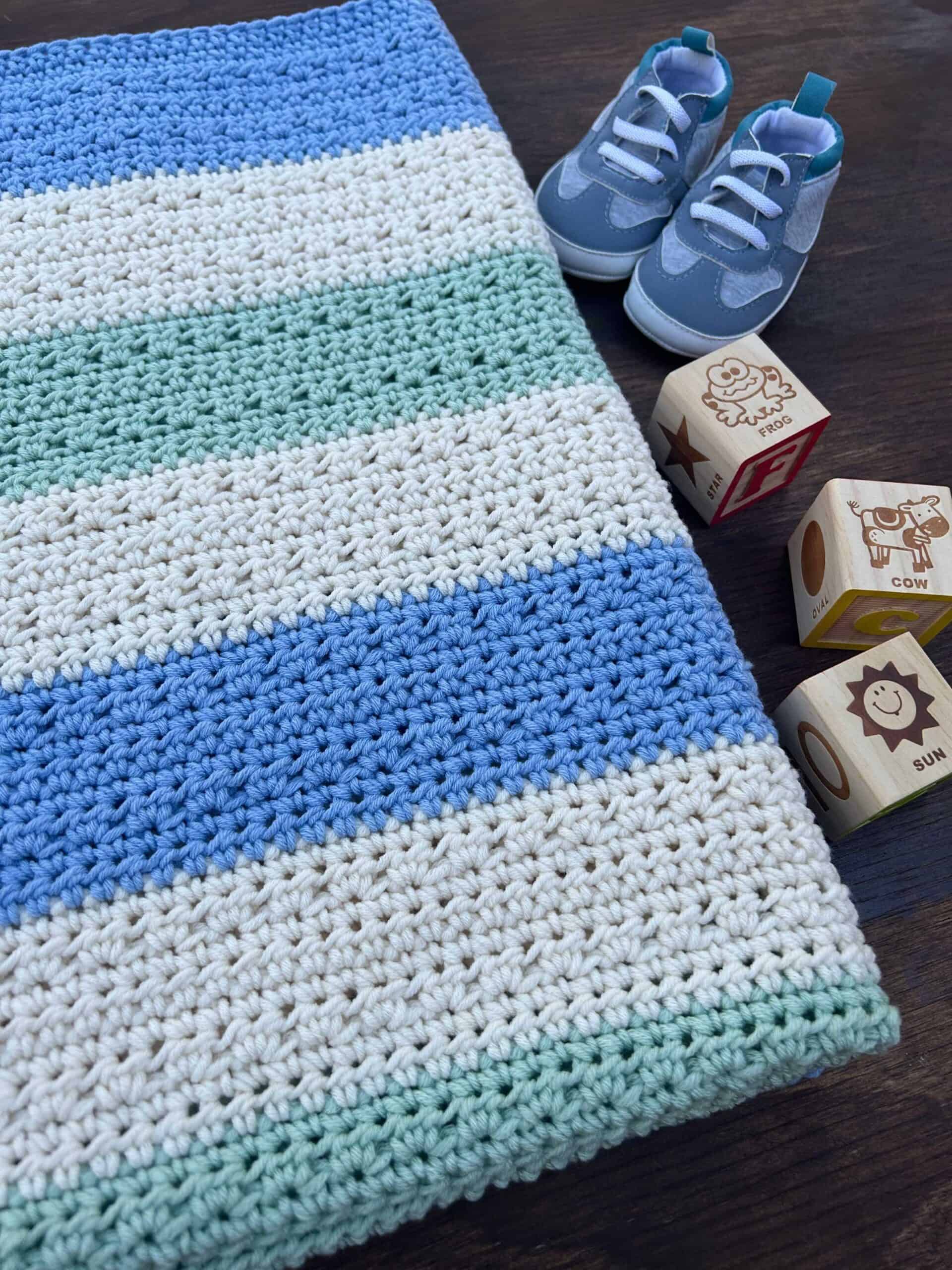 easy crochet baby blanket, wooden blocks, baby shoes