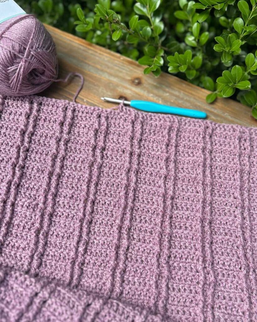 crochet project with hook and yarn