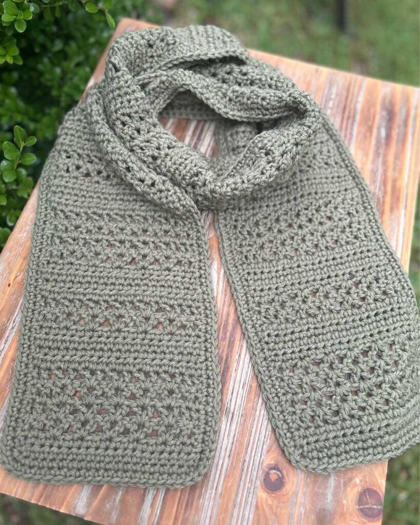 easy fall crochet scarf on outdoor table