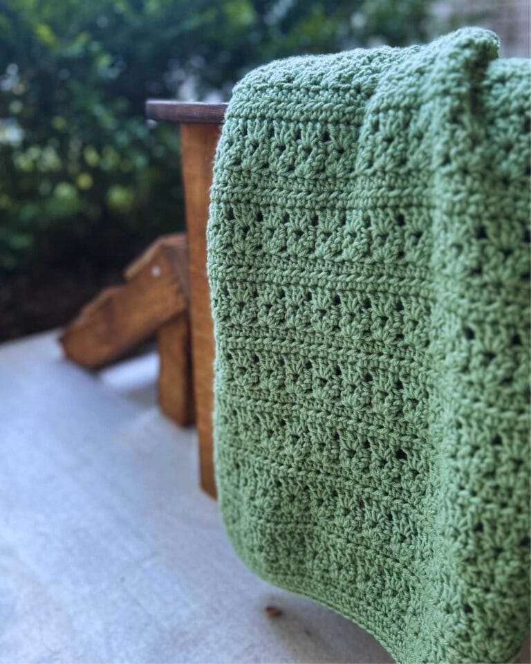 crochet throw blanket on outdoor chair