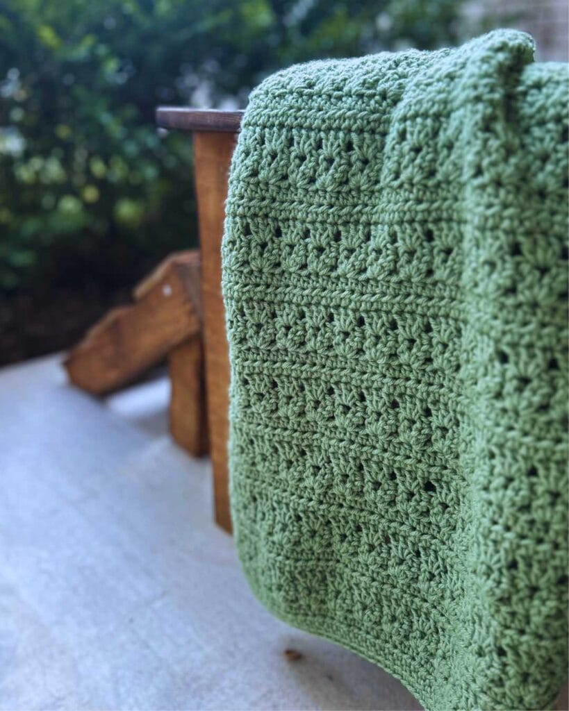 crochet throw blanket on outdoor chair