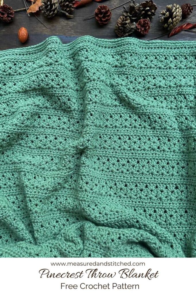 cluster v-stitch throw blanket with fall decor, text reads "www.measuredandstitched.com, Pinecrest Throw Blanket, Free Crochet Pattern"