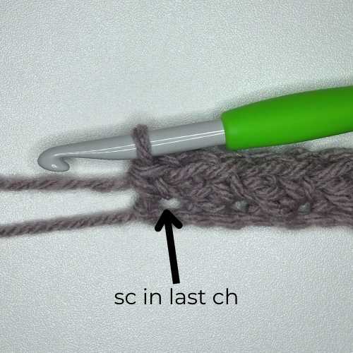 last stitch in Suzette Stitch row, text reads "single crochet in last ch"