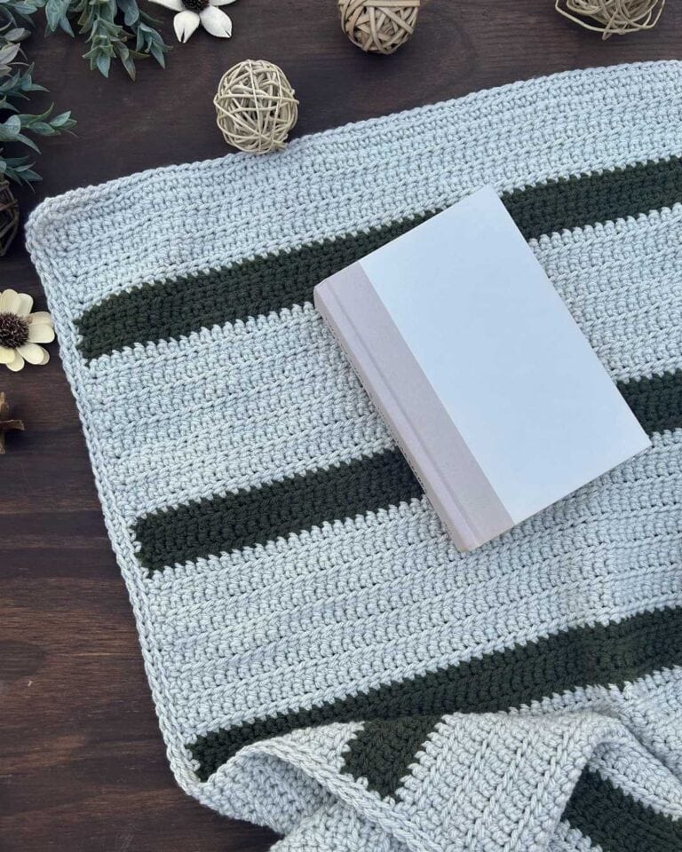 linked half double crochet throw blanket with book