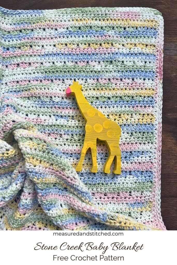 easy textured baby blanket pattern with wooden toy, text reads "measuredandstitched.com, Stone Creek Baby Blanket, Free Crochet Pattern"